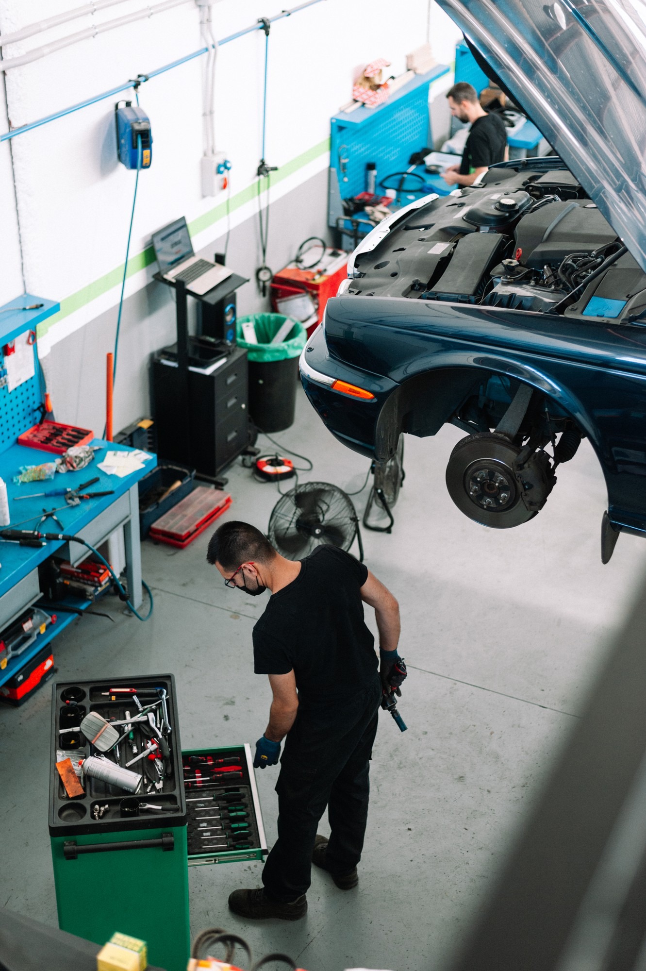 mechanic-fixing-car-auto-repair-shop